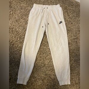 Nike sweatpants with pockets. Size small.